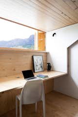 In the study on the home’s top level, a long window provides a panoramic view of Newlands Forest and Table Mountain. “The light in the morning is amazing, and the view of the mountain is incredible,” Derek says.