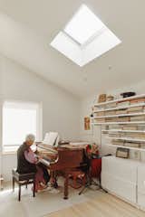 Shallow shelves in Jung-Ja’s practice room accommodate her many music books.