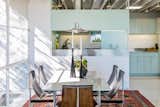 The kitchen is tucked behind the dining area. 