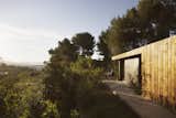 A Tiny Cabin Enhances a Family Retreat on the Edge of a Pine Forest in Southern France