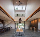 Above the dining room there is an atrium with 28-foot vaulted ceiling and skylights. While the steel “moment frame” structure was initially designed to be entirely framed in wood, the span required a switch to steel, which was left exposed as a design feature to create a “wow” moment upon entry. 