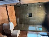 Guest bath with green and terracotta tile